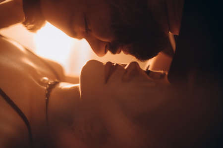 Love couple spending a time together, kissing and hugging.の写真素材