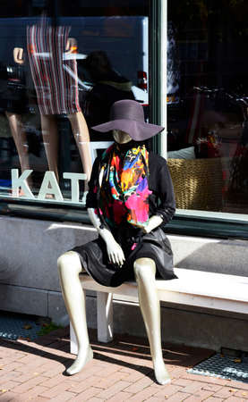 Seated Mannequin with Colorful Scarfの写真素材