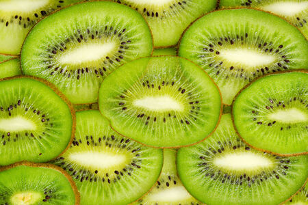 Sliced healthy kiwi fruits. Green textureの写真素材
