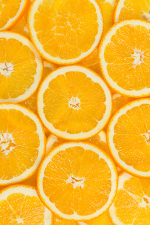 Sliced healthy orange fruits. Orange textureの写真素材