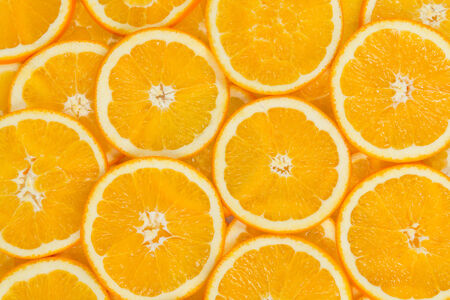 Sliced healthy orange fruits. Orange texture