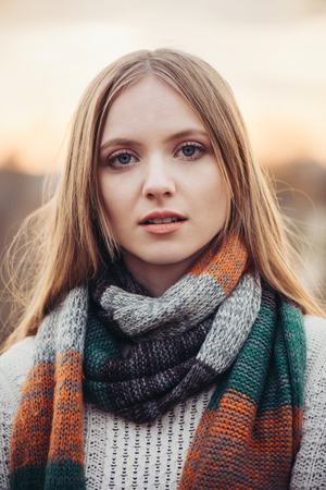 Beautiful young woman face with blue eyes on subsetの写真素材