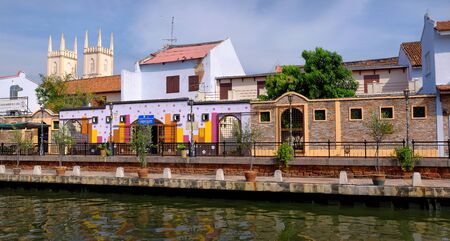 Malacca , Malaysia - March 22, 2016: Panorama of colorful buildings near the river in Malacca.