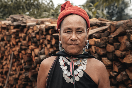Hta Nee La Len, Myanmar - May 25, 2016: Kayah women from hill tribe in Myanmar. They wear tradition clothes and necklaces made from silver coins.のeditorial素材