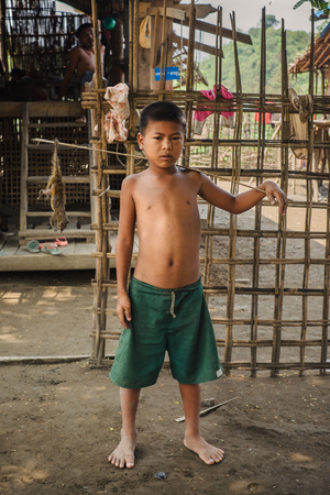 Pan Paung, Myanmar - May 30, 2016: Rural life of Myanmar children from the Chin state villageのeditorial素材