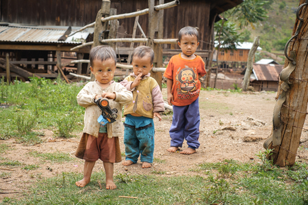 Pan Pet, Myanmar - May 25, 2016: Myanmar children in Karen tribe playing on the streetのeditorial素材