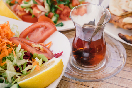 Traditional turkish food and tea on the tableの写真素材