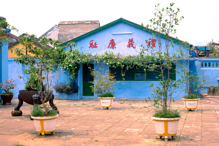 Hoi An, Vietnam - April, 05, 2016: Buddhist temple in ancient Hoian town with colorful wall and beautiful architecture. This place is popular tourist destination and UNESCO world heritage siteのeditorial素材