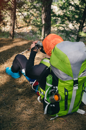 Male traveler shot from back regaining strength on the Lycian trail, Turkeyの写真素材