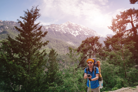 Male hiker on the background of Tahtali mountain on a sunny dayの写真素材