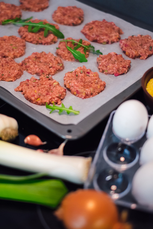 Healthy and vegetarian food. Vegetable cutlets from pumpkin, egg, carrot, millet and beetrootの写真素材