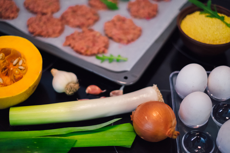Healthy and vegetarian food. Vegetable cutlets from pumpkin, egg, carrot, millet and beetrootの写真素材