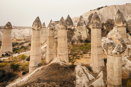 Beautiful Love valley with blue sky in Cappadocia landscape, Goreme village, Turkeyの写真素材