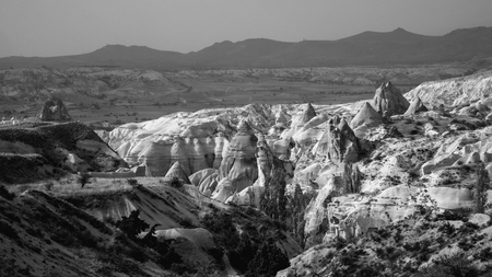 Beautiful black and white mountain landscape in Cappadocia Rose valley with big limestone hills, Turkey, Goremeの写真素材
