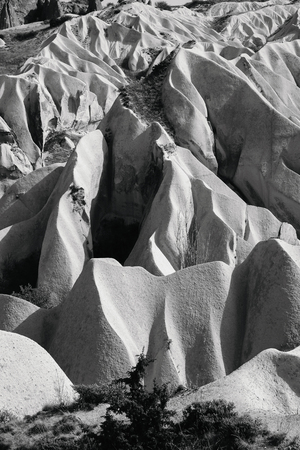 Beautiful black and white mountain landscape in Cappadocia Rose valley with big limestone hills, Turkey, Goremeの写真素材