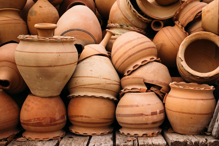 Close up of heap of clay pots in Goreme, Cappadocia. Turkey traditional ceramic.の写真素材