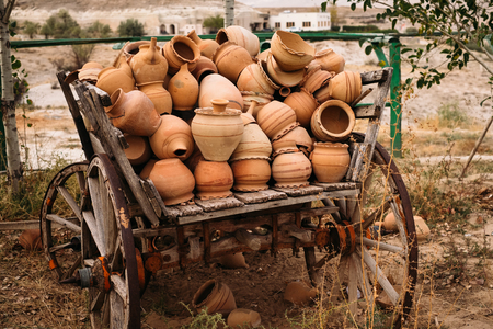 Turkish traditional clay pot decoration on the wheel in Cappadocia with Goreme landscape backgroundの写真素材