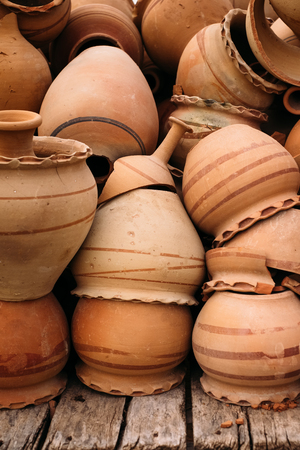 Close up of heap of clay pots in Goreme, Cappadocia. Turkey traditional ceramic.の写真素材