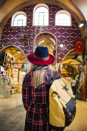 Woman walking on beautiful Grand Bazaar market in Istanbul, travel to Turkeyの写真素材