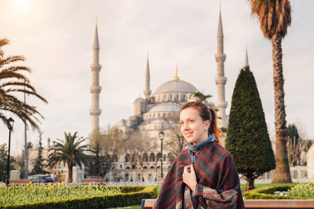 Woman enjoy beautiful view on Sultanahmet Blue Mosque , famous islamic Landmark mosque, Travel to Istanbul, Turkeyの写真素材