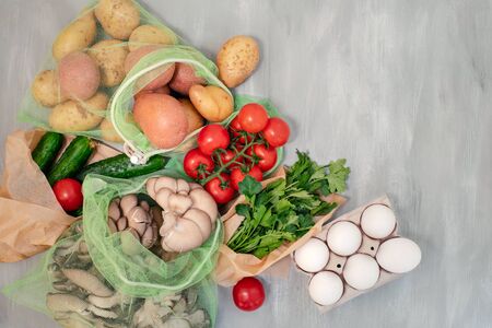 Zero waste - vegetable in reusable bags, top viewの写真素材