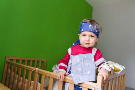 Little girl playing games and having fun at homeの写真素材