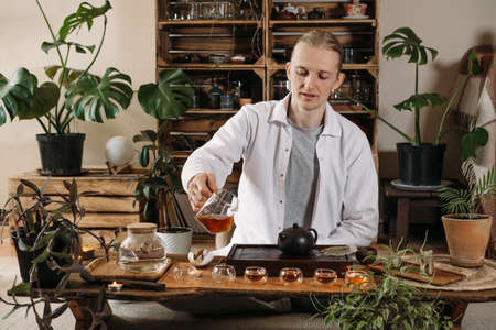 Beautiful traditional chinese tea ceremony with candle and decorationの写真素材