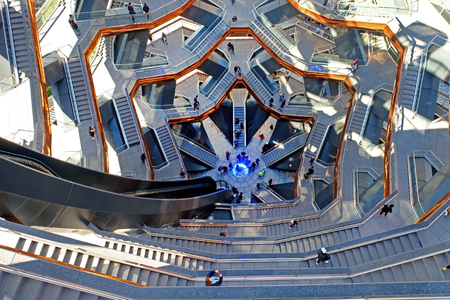 New York - October 10, 2019: Looking down into The Vessel, Hudsonâs Yard, Manhattan, the elaborate honeycomb like structure rises 16 stories, 154 flights of stairs and 2,500 steps and 80 landings for visitors to climb, in Hudsonâs Yard, Manhatten.のeditorial素材