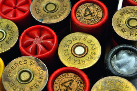 shotgun and its cartridges. Still life representing hunting.の写真素材