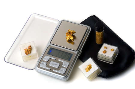 Weighing of goldの写真素材