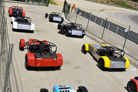chases of Caterham on the circuit of the Cevennes with Ales in the French department of Gard the May 24th and 25th, 2013. on the starting line before the raceのeditorial素材