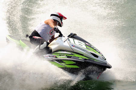 Ales - France - on July 14th, 2013 - Championship of France of Jet Ski on the river Gardon. Hervé Partouche stops his machine in a tight turnのeditorial素材