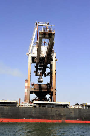 unloading of an ore cargo liner for the steel-works at Fos-sur-Mer beside Marseille の写真素材