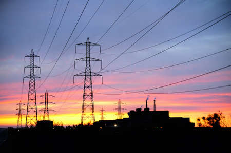 Line with high voltage with the last gleams of the day 