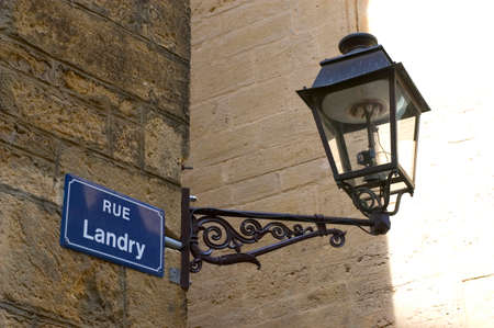 Plate Landry Street and public lighting lanternの写真素材