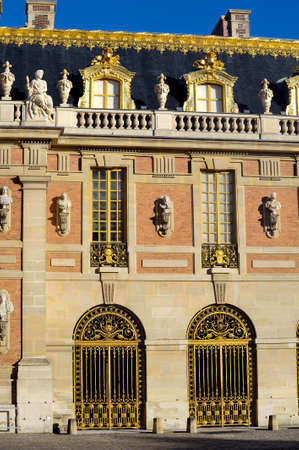 chateau de Versailles, architectural detail and gilding of the facade and roofのeditorial素材