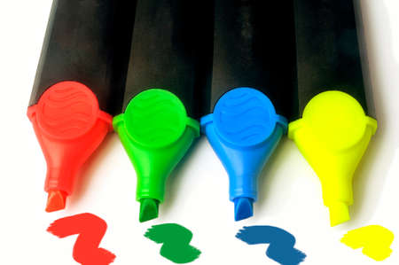 Highlighters blue, green, red and yellow on white 