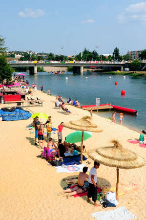 Beach every summer Ales mounted on the banks of the River Gardon where locals can come and spend time at the waterのeditorial素材