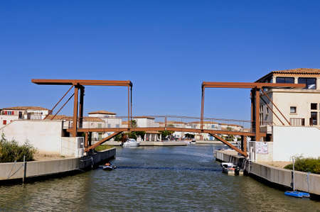 Residential area with marina at Aigues-Mortes in the heart of the Camargue in the south-east of France.の写真素材