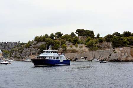 Tourists on boat along the creeks of Marseille to discover the beautiful landscapes of the National...