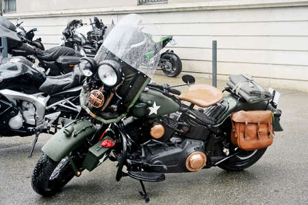 A motorcycle in the style army stationed at a gathering of American motorcycles in Beaucaire in the French department of Gardのeditorial素材