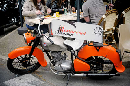Old motorcycle using menu door in a restaurant in a gathering of American motorcycles in Beaucaire in the French department of Gardのeditorial素材