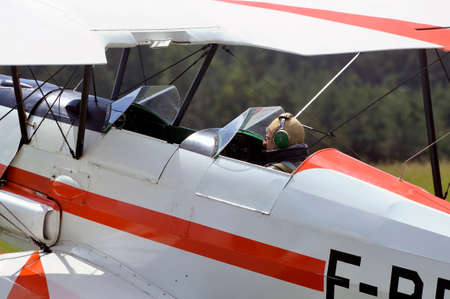 Pilot of a biplane happy after landing on the Mende airfield in the French department of Gardのeditorial素材
