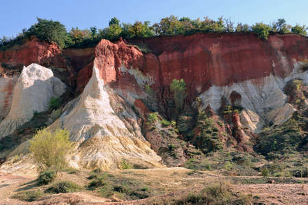 red landscape dug by six generations of miners ocher Colorado Provencal at Rustrel in the south of...