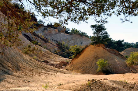 red landscape dug by six generations of miners ocher Colorado Provencal at Rustrel in the south of...