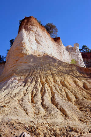 red landscape dug by six generations of miners ocher Colorado Provencal at Rustrel in the south of...
