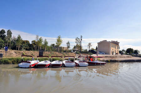 rental of small boats on the canal du midi at the locks of Fonterannes near Beziersのeditorial素材