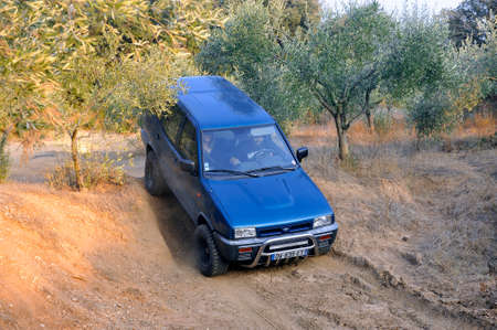 Nissan Terrano in action on a dirt track on a trial circuit