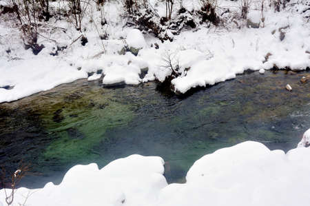 the Gardon snowy river in the French region of Cevennes and the Gard department next to Anduzeの写真素材