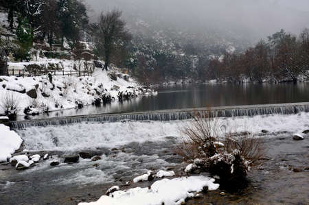 Le Gardon snowy river in the French region of Cevennes and the Gard department next to Anduzeの写真素材